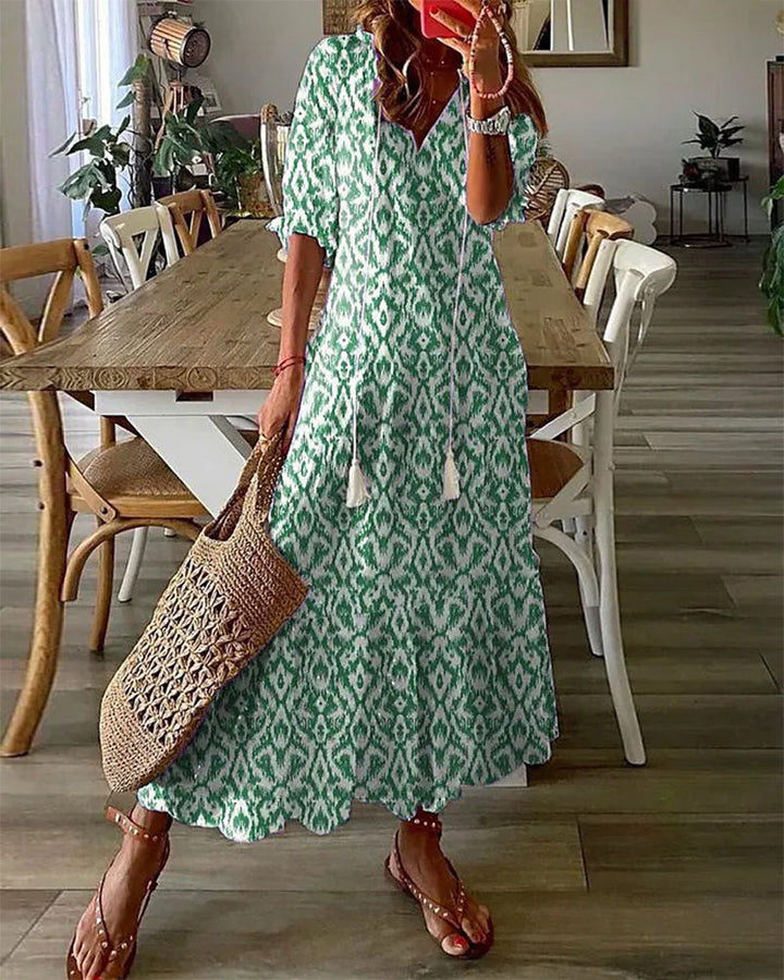 LISA | Lange Geprinte Jurk met 3/4 Mouwen en Elegante Koorddetails