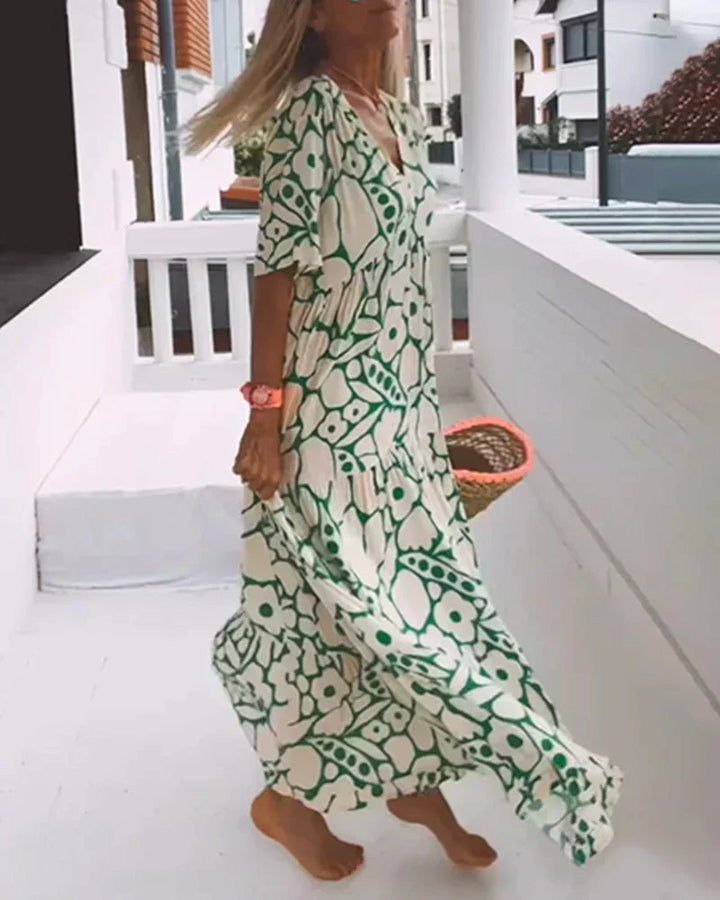 KIONA | Lange Zomerjurk met Vloeiende Snit en Elegante Grafische Motief