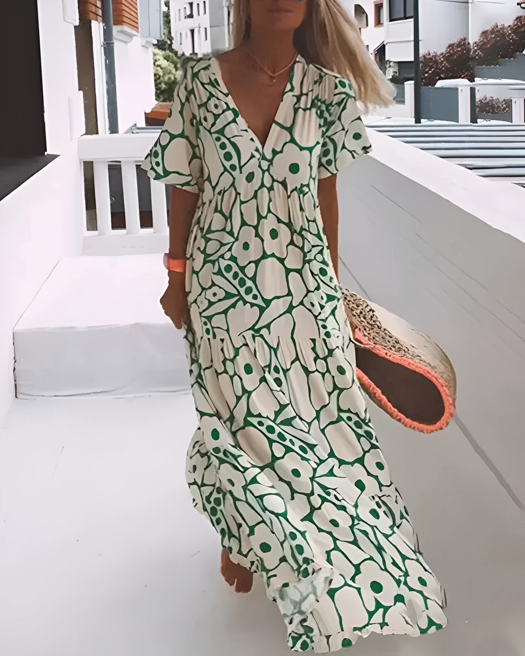 KIONA | Lange Zomerjurk met Vloeiende Snit en Elegante Grafische Motief