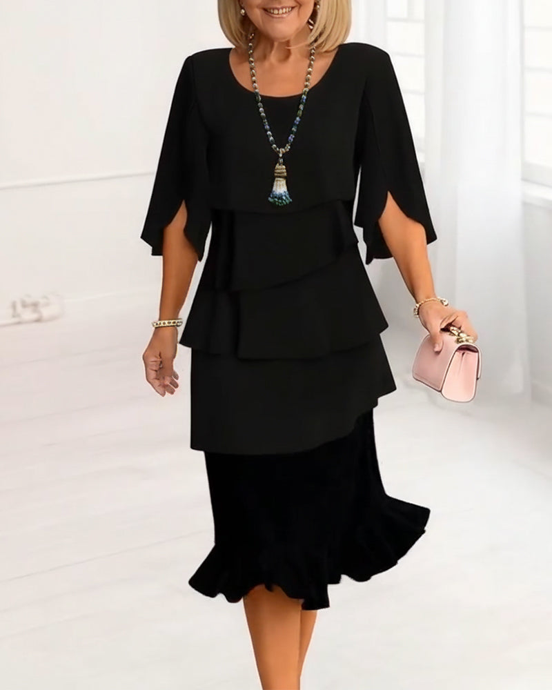 KITA | Elegante midi-jurk met ruffle-stijl mouwen