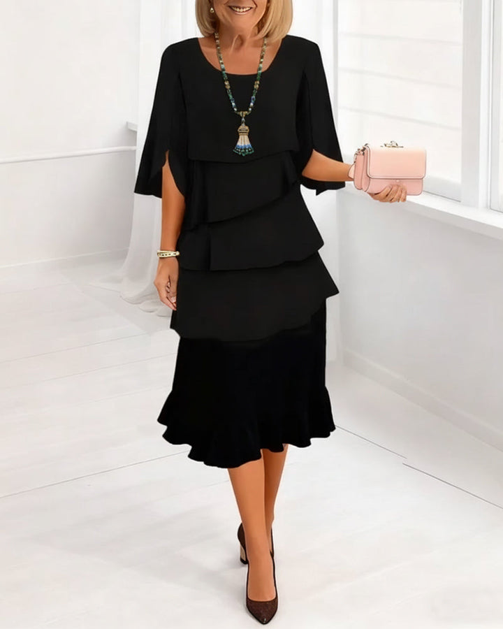 KITA | Elegante midi-jurk met ruffle-stijl mouwen