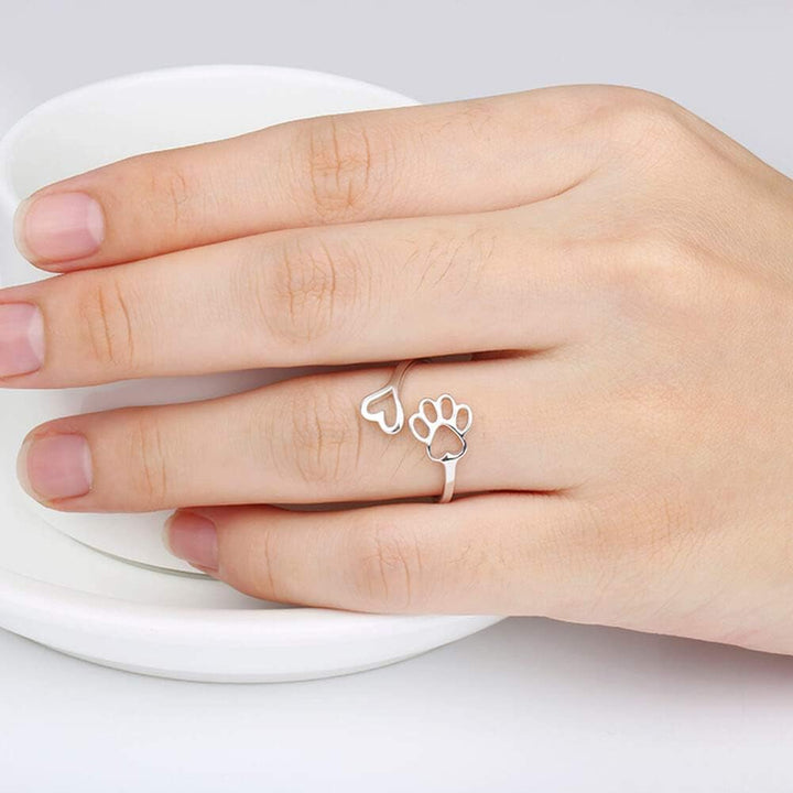 Ambachtelijke ring met poot en hart