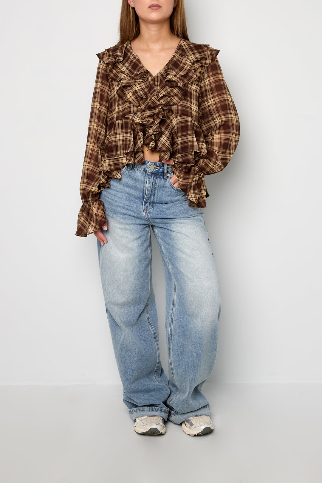 De geruite blouse