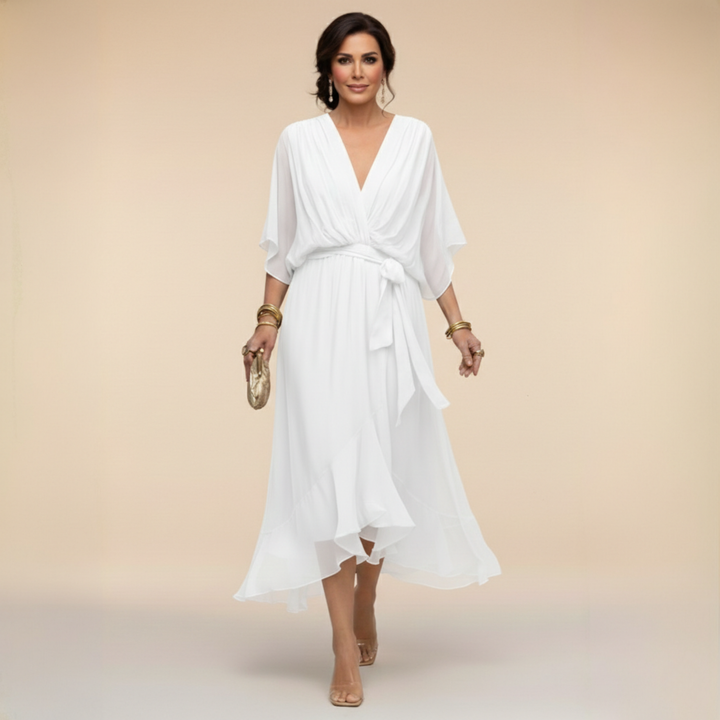 FAY™ | Stralend de zomer door met de FAY™ V-hals Jurk.