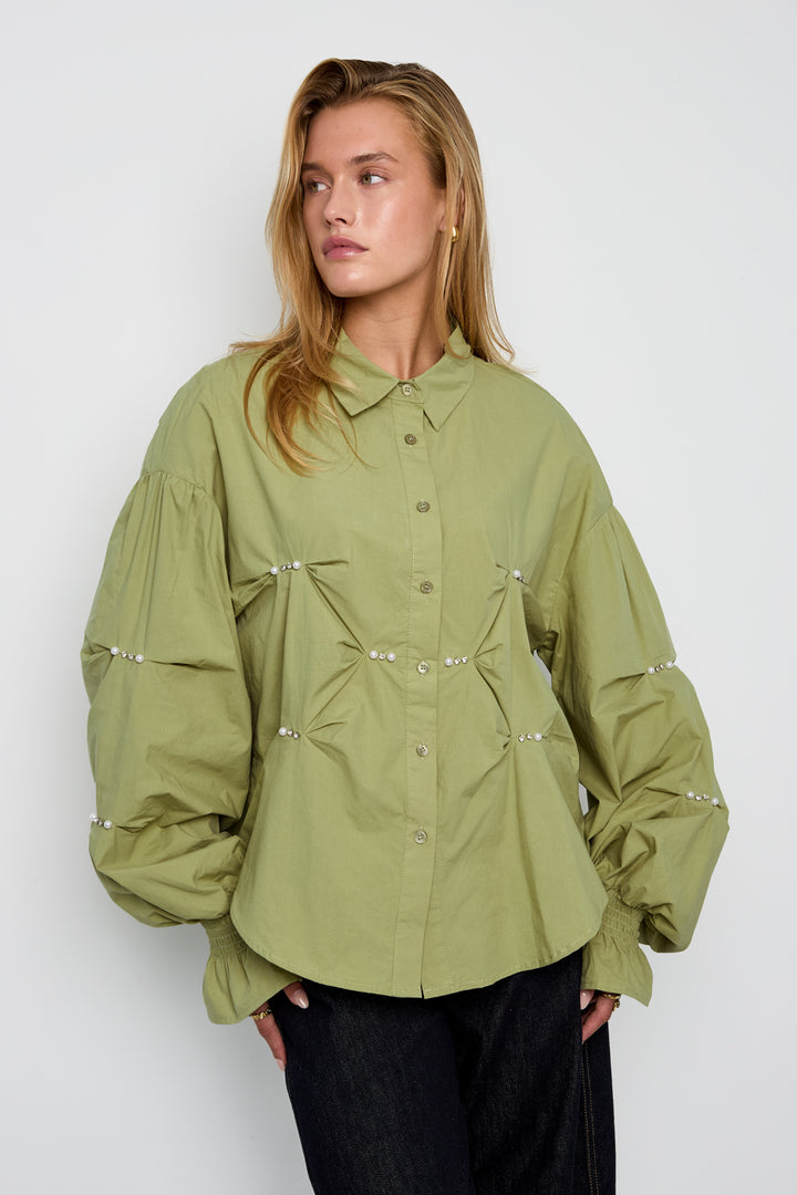 De dromerige blouse