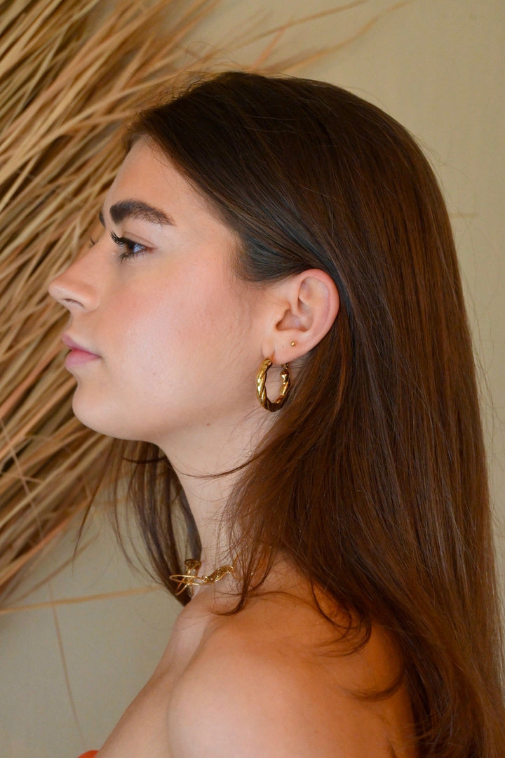 Curly hoops - goud
