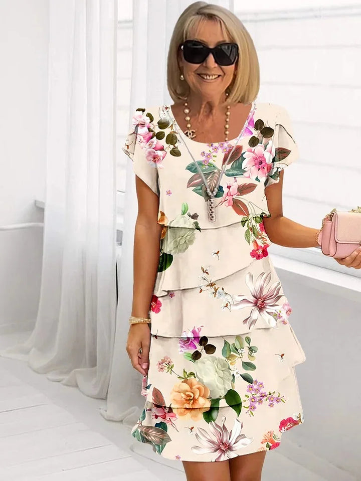 MOYA | Lange Bloemenjurk met Een Flatterende en Elegante Pasvorm