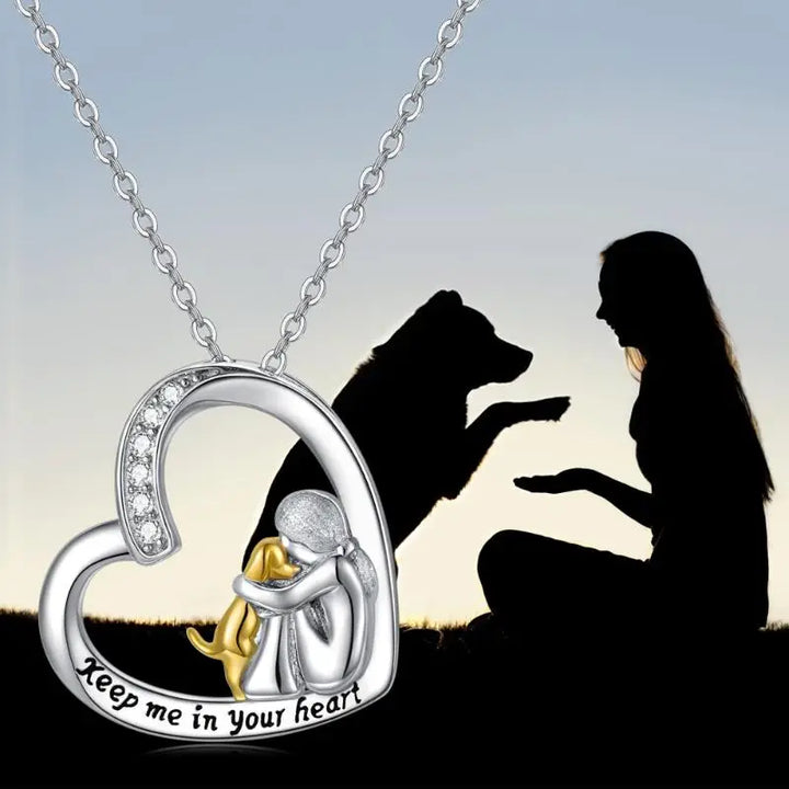 Halsketting met hart van zilver met hond en zirconia stenen