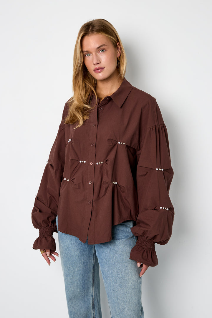 De dromerige blouse