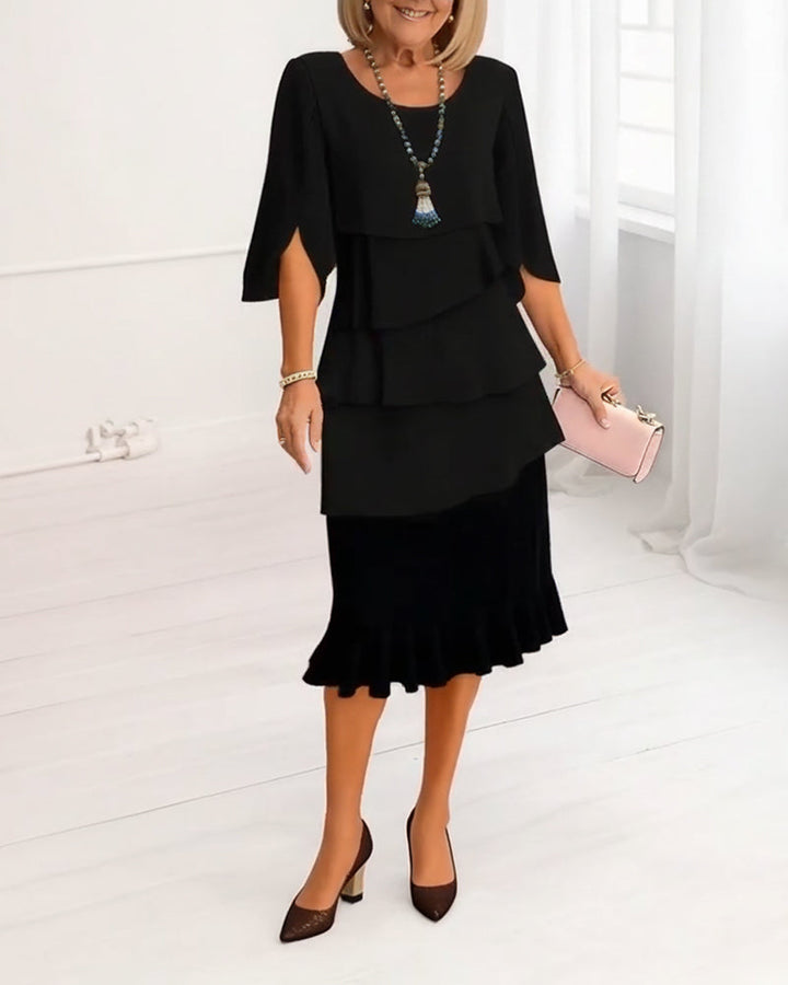 KITA | Elegante midi-jurk met ruffle-stijl mouwen