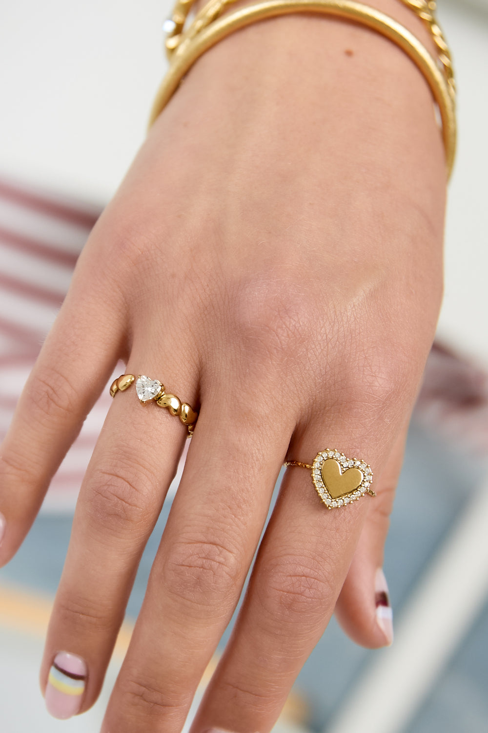 Ring met wisselende harten en zirkonia