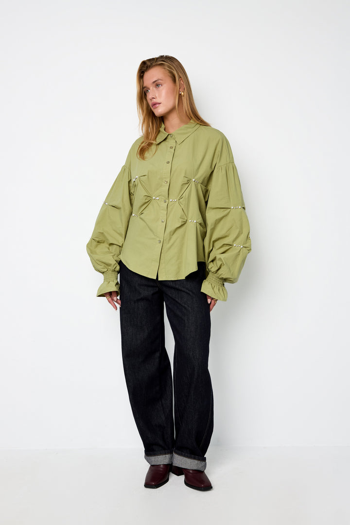 De dromerige blouse
