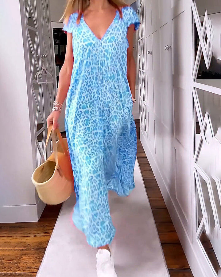 MIA | Lange Geprinte Jurk met V-hals en Korte Mouwen voor een Boho Zomerse Look