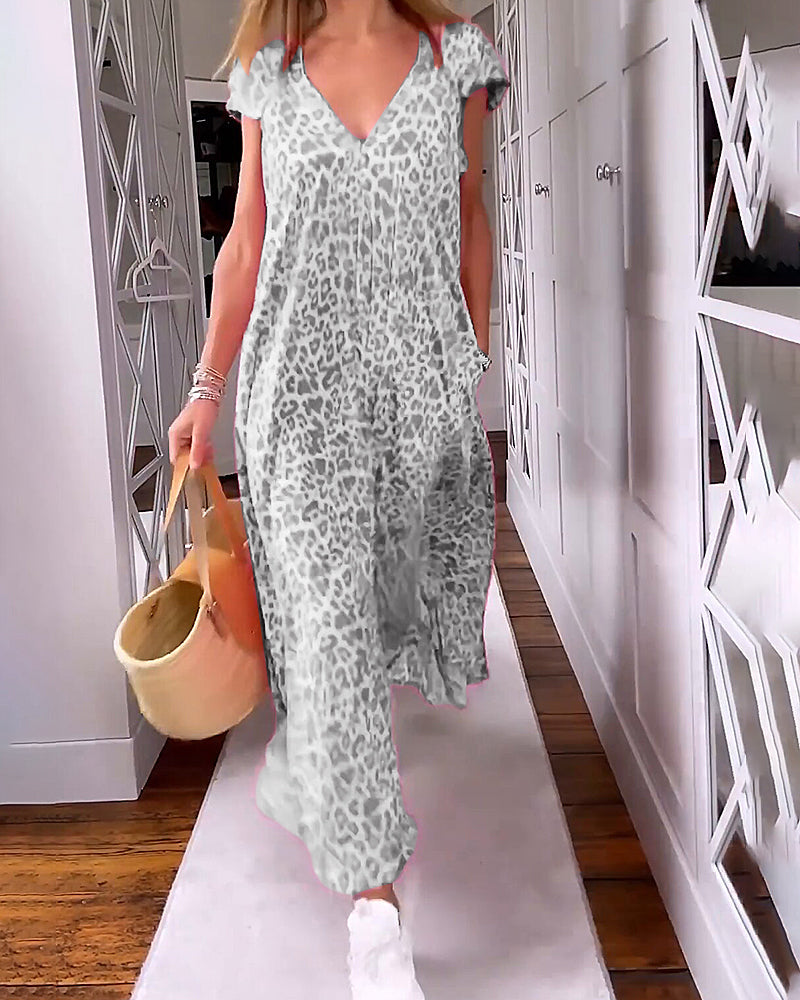 MIA | Lange Geprinte Jurk met V-hals en Korte Mouwen voor een Boho Zomerse Look