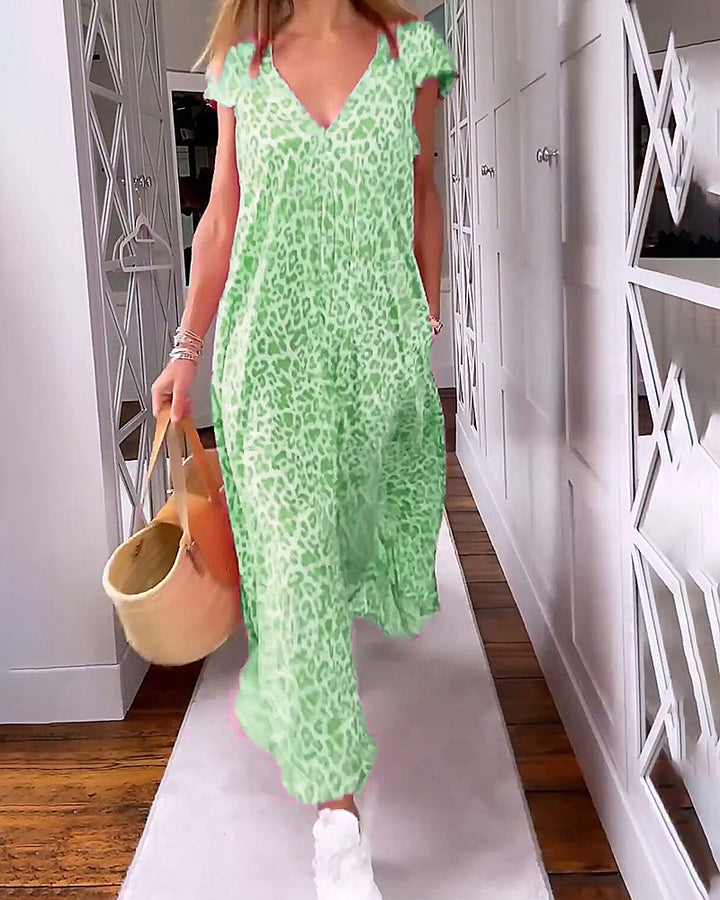 MIA | Lange Geprinte Jurk met V-hals en Korte Mouwen voor een Boho Zomerse Look
